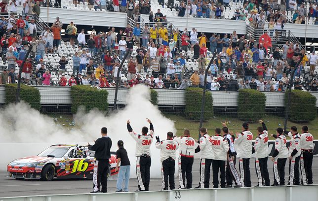 The No. 16 3M Roush Fenway Racing NASCAR Sprint Cup Series crew salutes driver Greg Biffle after winning the Sunoco Red Cross Pennsylvania 500 Sunday at Pocono Raceway in Long Pond, Pa. Credit: Chris Trotman/Getty Images for NASCAR
